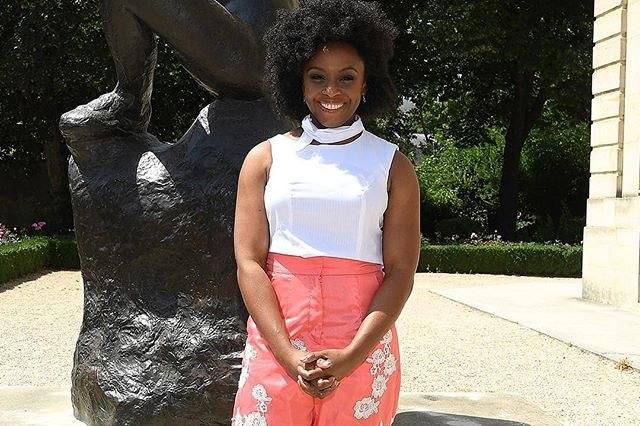 Nigerian author Chimamanda Adichie spotted at the Dior Haute Couture show wearing Nigerian designer Ladunni Lambo