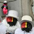 The Noirauds hope that, with red and yellow stripes alongside the traditional black, their costume will no longer attract comparison to racist "blackface" caricatures