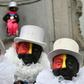 The Noirauds hope that, with red and yellow stripes alongside the traditional black, their costume will no longer attract comparison to racist "blackface" caricatures