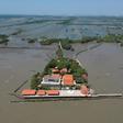 A dangerous combination of climate change, industrial farming and rapid urbanisation are endangering the Gulf of Thailand's coasts, stripping away precious mangrove trees and leaving some buildings like the temple at Samut Chin surrounded by sea water