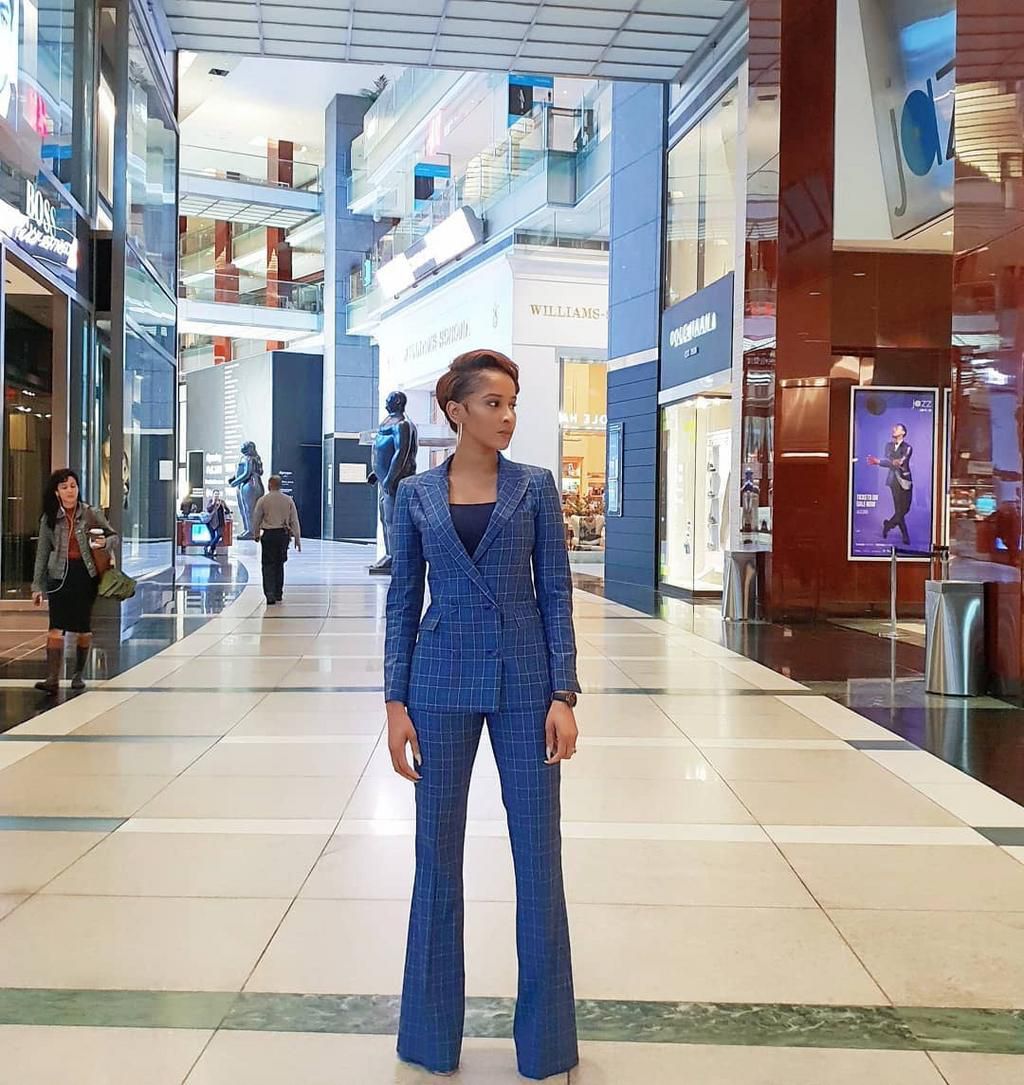 Adesua Etomi wearing a sharp tailored suit by Mai Atafo [Credit: Vogue]