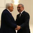 Analysts say Palestinian president Mahmud Abbas (L) retains the real decision making power despite prime minister Mohammad Shtayyeh (R) forming a new government