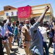 Sudanese protesters chant slogans as they respond to a call to march on the army headquarters in Khartoum