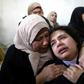 Mourners attend the funeral of 17-year-old Sajid Muzher, who the Palestinian health ministry said was killed by Israeli forces during clashes in the West Bank