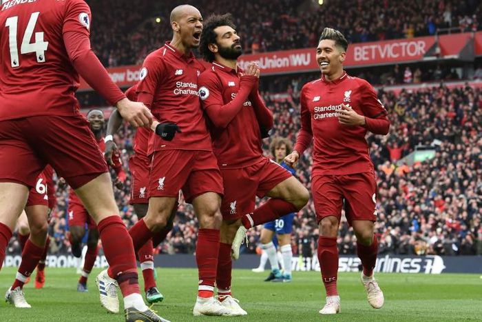 Mohamed Salah celebrates after scoring Liverpool's second goal in their win over Chelsea