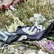 A flag of the Islamic State group lies on the ground in the Syrian village of Baghouz after the group's "caliphate" was defeated in March by US-backed forces