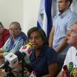 Frederic Coppens (right) and his wife Tamara Zamora (second right) fear for their daughter Amaya who has been on hunger strike for a week