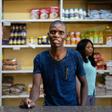 Grocery store owner Blessing Mushonga in his shop in Rimuka township, Kadoma. Life is getting harder for many Zimbabweans as the economic crisis worsens -- daily necessities are often in short supply