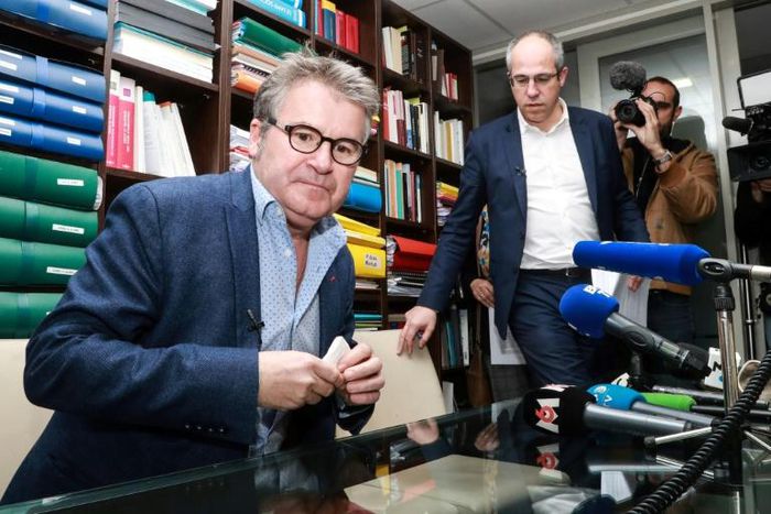French farmer Paul Francois, left, and his lawyer Francois Lafforgue at a press conference in Lyon, southeast France, after an appeals court upheld his lawsuit against Monsanto over its Lasso weedkiller
