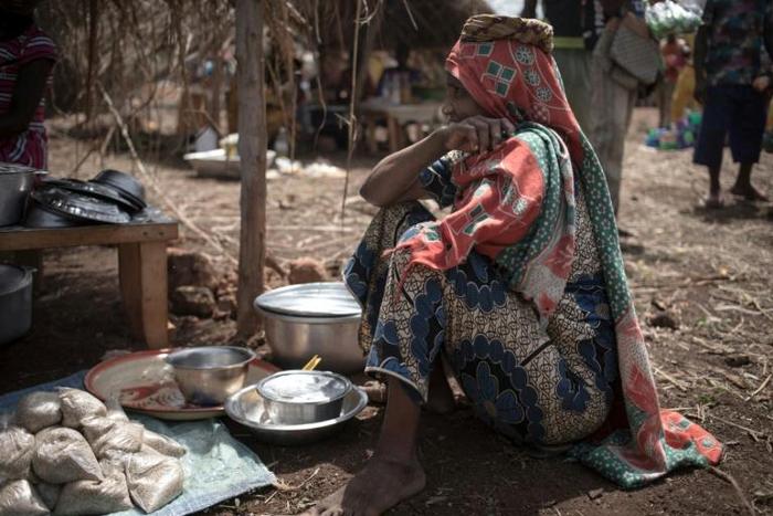 A woman at a market in Awatche, where herding and farmer communities have decided to live in harmony