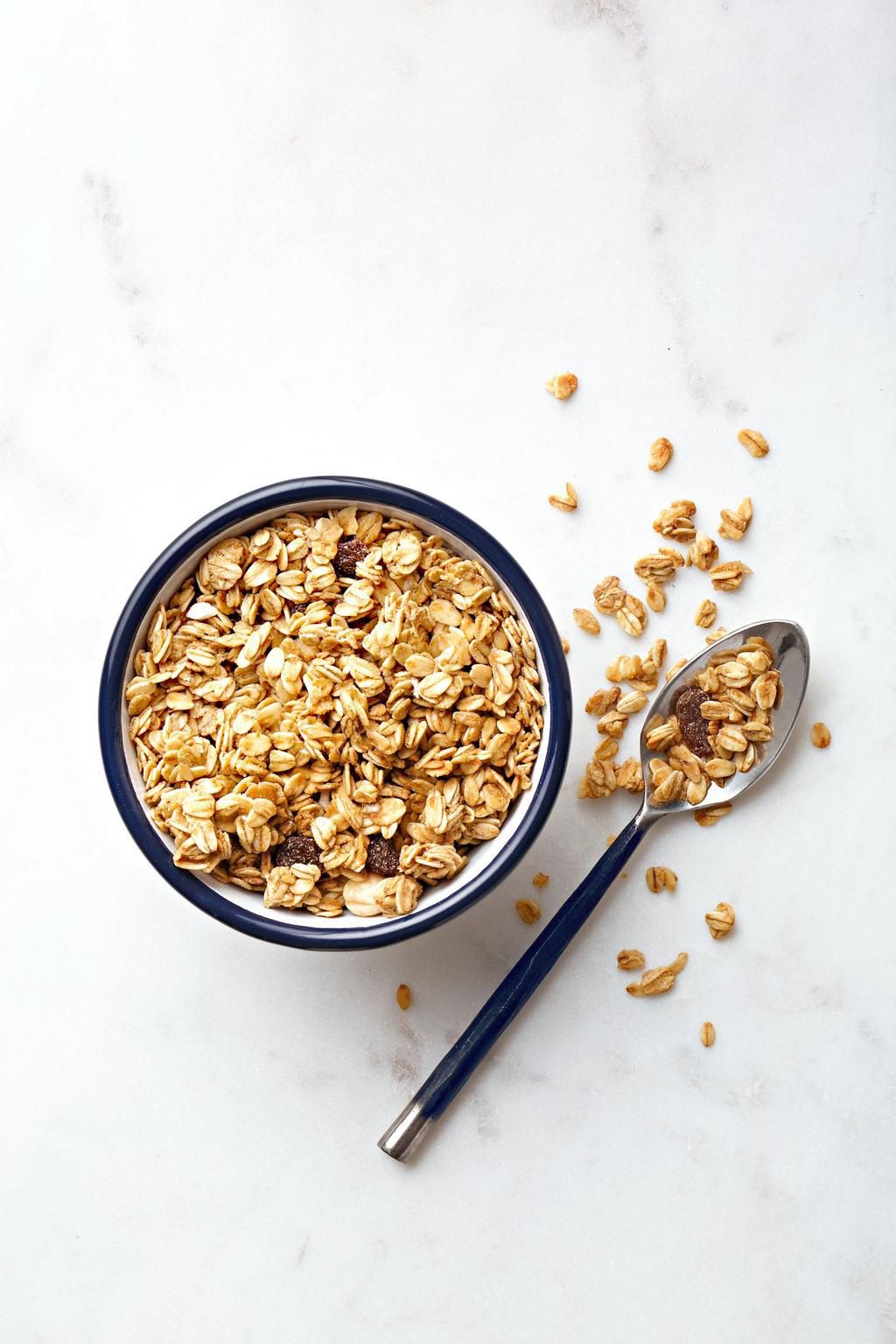 Directly Above Shot Of Oat Flakes In Bowl On Marble Table