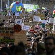 Marches calling for government action on climate change, such as this one in Lyon, took place across France