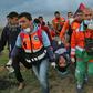 Palestinian paramedics carry a protester injured in a demonstration along the Gaza-Israel border on March 1, 2019