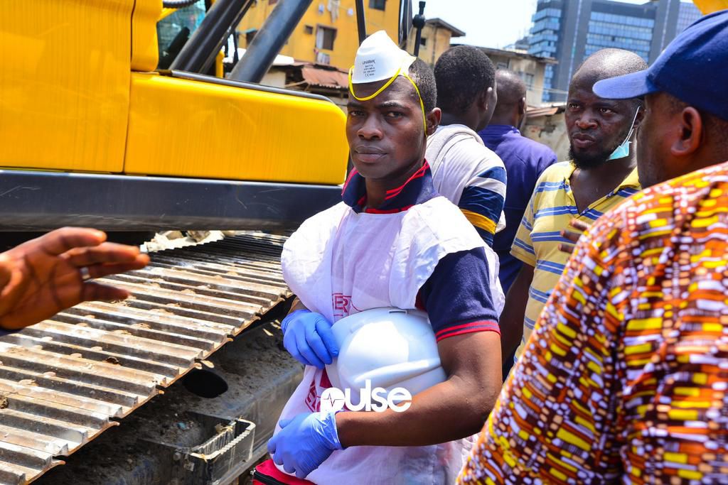 A rescue operative at the site of the collapsed building (Pulse)
