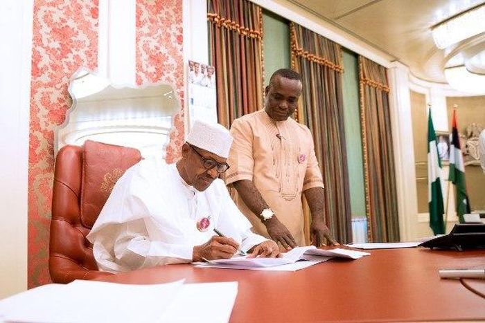 Buhari signs eight bills to law few days after Obasanjo's open letter to him.
