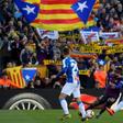 Barcelona supporters wave Catalan pro-independence Estelada flags at the club's Camp Nou stadium -- but many pro-and anti residents of the region with both sides could come together and reject radical approaches