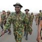 Chief of Army staff Lit-Gen. Tukur Buratai leading troops out on a parade [Twitter/@HQNigerianArmy]