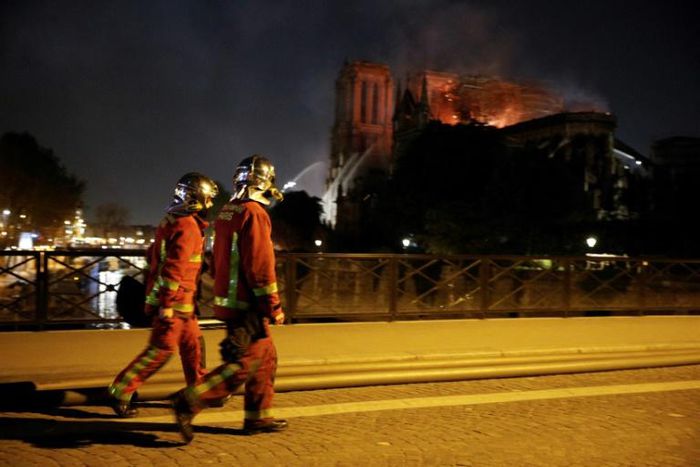 Firefighters have entered the cathedral and brought out some priceless artworks