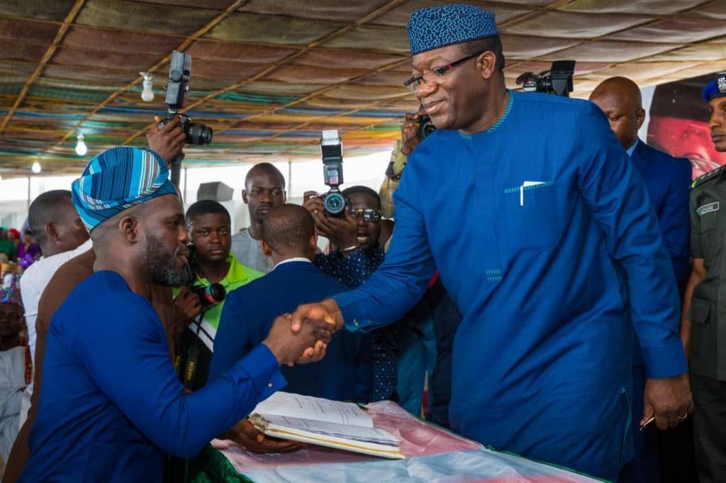 Governor Kayode Fayemi at the swear-in ceremony of his commissioners and other ranks of political office holders in Ekiti state [Twitter/@AO1379]