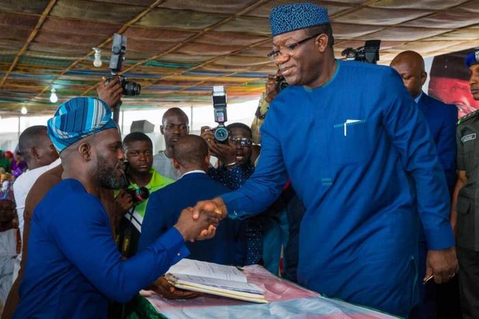Governor Kayode Fayemi at the swear-in ceremony of his commissioners and other ranks of political office holders in Ekiti state [Twitter/@AO1379]