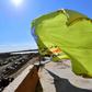 The yellow flag of the Kurdish-led Syrian Democratic Forces billows over the Islamic State group's last redoubt of Baghouz after the jihadist black flag is finally torn down