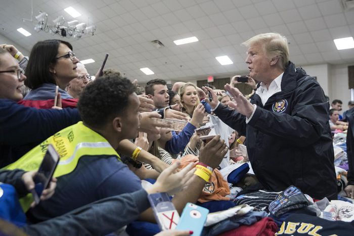 Trump Surveys Tornado Damage in Alabama, and Signs Some Bibles, Too