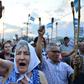 Protestors march to demand the resignation of Honduran President Juan Orlando Hernandez