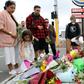 People from all walks of life arrived at the police barriers near the mosques on Saturday to pay their respects and to show support for New Zealand's 50,000 Muslims