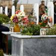 A woman in the northeastern Syrian town of Qamishli visits a grave during the February 2019 funeral of a fighter from the Kurdish-led YPJ. The Syrian Kurdish administration is seeking an international tribunal to try members of the Islamic State group