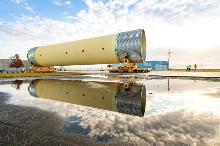 In this photo obtained from NASA, technicians at NASA's Michoud Assembly Facility in New Orleans move the largest piece of structural test hardware for the new deep space rocket, the Space Launch System (SLS)