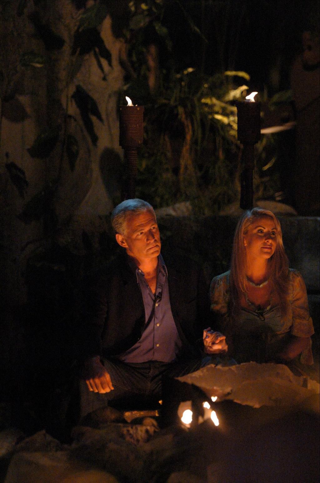 Tom and Katie wait to see which of them won Survivor:Palau.