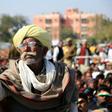 Smartphone users in emerging nations such as India, where this farmer is seen at a rally, say they get benefits from the devices but worry about the impact of digital technology on children
