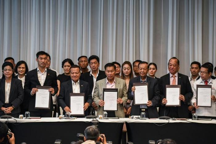 Seven anti-junta parties in Thailand formed a coalition vowing to thwart military rule after the country's first vote since 2014