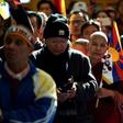 Supporters of the Dalai Lama chanted and prayed at the Buddhist shrine in mountainous Dharamsala - home to Tibet's government in exile