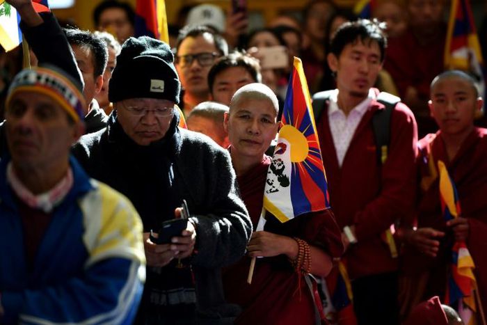 Supporters of the Dalai Lama chanted and prayed at the Buddhist shrine in mountainous Dharamsala - home to Tibet's government in exile