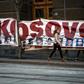 A banner commemorates the anniversary in Belgrade