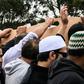 Mourners carry the coffin of Mohammed Daoud Nabi, 71, who unknowingly opened the door to his killer at the city's Al Noor mosque, reportedly welcoming him with the words 'Hello Brother'