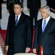 Brazilian President Jair Bolsonaro (L) was greeted on arrival in Israel by Prime Minister Benjamin Netanyahu