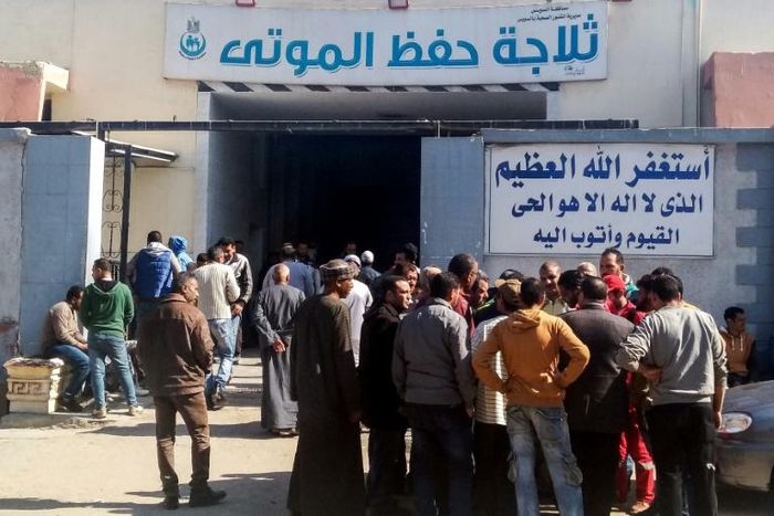 Relatives of the victimes of an explosion at a chemical plant in Egypt's Ain Sokhna gather at a morgue in nearby Suez to receive their bodies