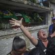 A relative reacts during the funeral of Brazilian musician Evaldo dos Santos Rosa, who was killed by an army unit when it shot at his car by mistake