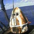This still image taken from NASA TV shows SpaceX's Crew Dragon spacecraft safely aboard the company's recovery vessel following splashdown on March 8, 2019