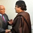 Zuma, left, pictured with Kadhafi on May 30 2011, when he made a one-day visit to Tripoli as head of an African Union delegation mediating in the Libyan crisis. Zuma has denied a newspaper report that he was given $30 million by Kadhafi for 'safe keepi...