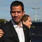 Venezuelan opposition leader and self-proclaimed acting president Juan Guaido (L) has said he is returning to his country on Monday