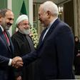 Iranian Foreign Minister Mohammad Javad Zarif welcomes Armenian Prime Minister Nikol Pashinyan to Tehran in front of a smiling President Hassan Rouhani who rejected his top diplomat's resignation