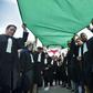 Algerian lawyers and journalists take part in a protest against their ailing president's bid for a fifth term in power, in Algiers