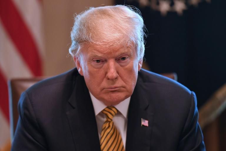 A threat by US President Donald Trump to impose car import tariffs on Mexico appeared to move him away from a previously threatened closing of the border