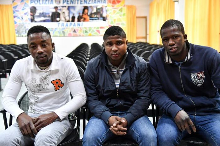 (From l) Ivorian Fofana Lamine, 25, Gambian Cherno Jallow, 22 and Senegalese Cheikhaya Dieng, 26, are due to be released from an Italian jail