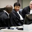 International Criminal Court chief prosecutor Fatou Bensouda (C) would continue to pursue her duties "without fear or favour" despite the ban, her office said