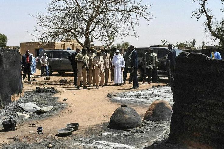 "We need security here... Justice will be done," President Ibrahim Boubacar Keita, shown in this government handout picture, said during a visit to the village where the massacre took place