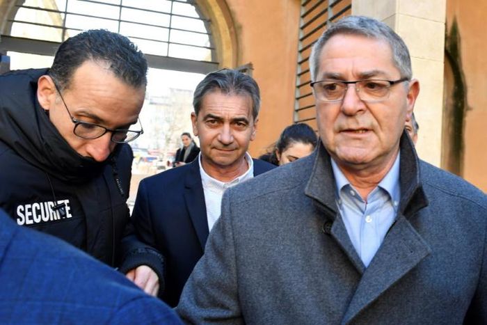 Ex-air force pilots Pascal Fauret (R) and Bruno Odos (C) were jailed for six years each